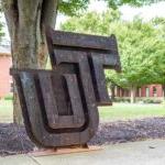 TU bronze signage